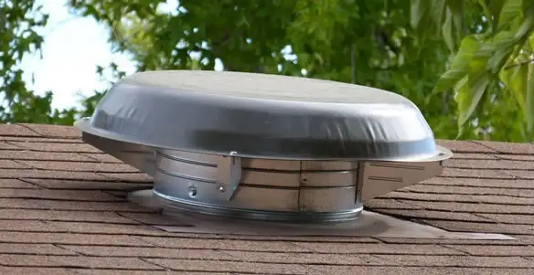 attic fan installation services with low-profile roof ventilation unit in Charlotte, NC