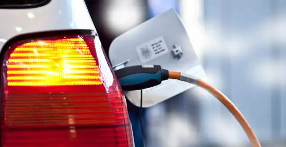 Electric car plugged into EV charger after professional installation in Charlotte, NC