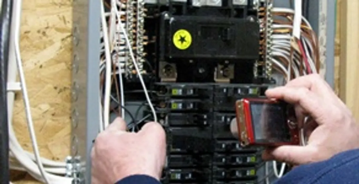 Home electrical inspection of circuit breaker panel by licensed electrician in Charlotte, NC