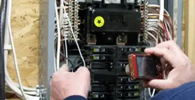 Home electrical inspection of circuit breaker panel by licensed electrician in Charlotte, NC