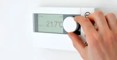Thermostat installation service with professional adjusting temperature control in Charlotte, NC