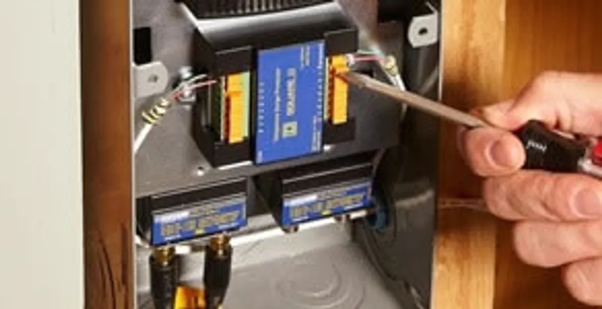 Whole home surge protection device being installed by a licensed electrician to protect electrical systems in Charlotte, NC